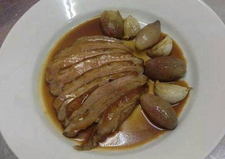Duck breast with caramelized shallots and roasted garlic