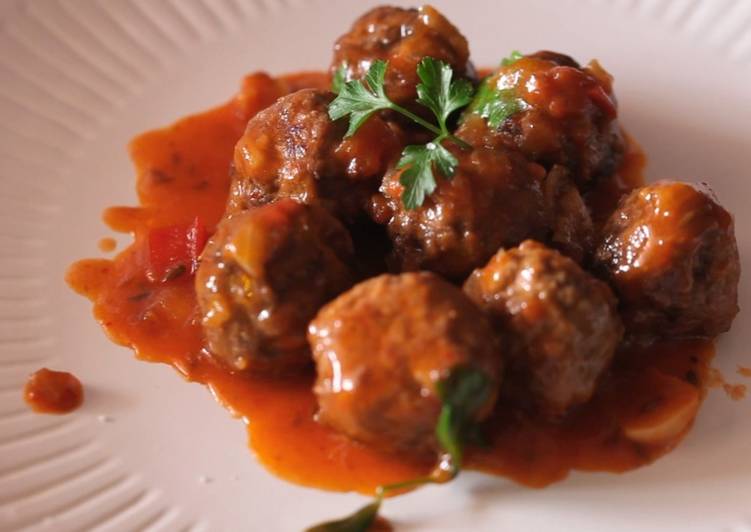 Meatballs cooking in an EVOO from Spain Sauce