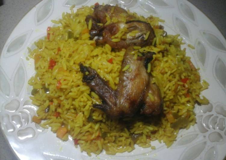 Fried rice& chicken wings...#Abujamoms