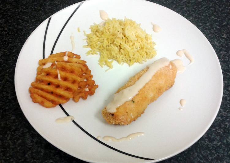 chicken roll with a cream spiced fillin, paprika rice, crispy potato slice & four cheese sauce
