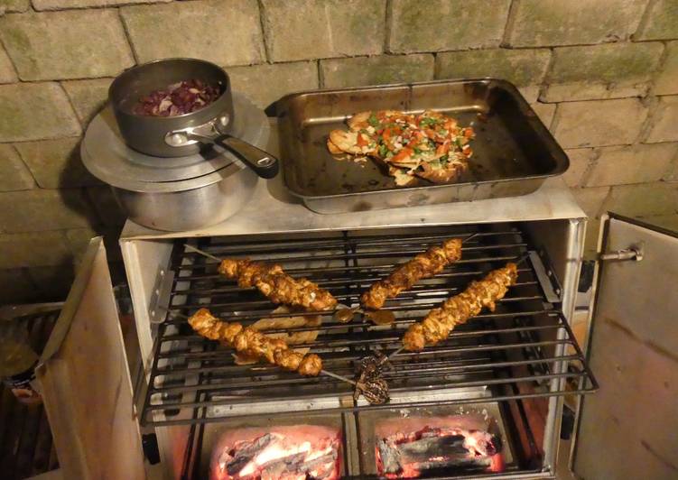 Chicken satay kebabs and home made pili pili cheesy chapati nachos in the jiko oven :)