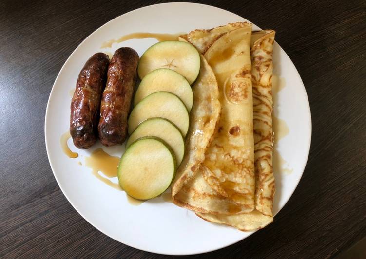 Brunch pancakes with sausage, pear and maple syrup