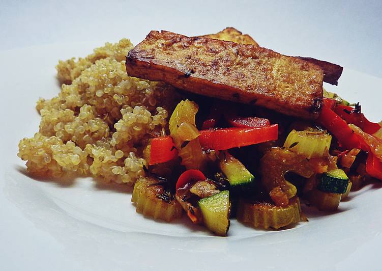 Tofu steak with fried vegetables and quinoa