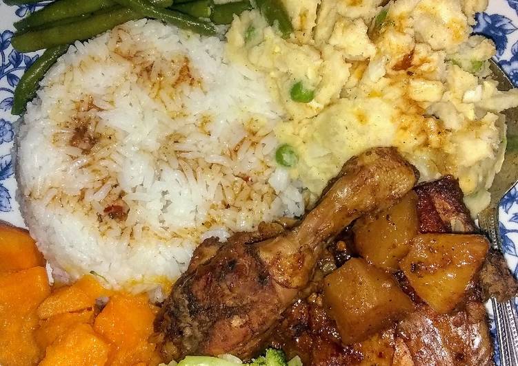 Homestyle chicken, mashed potatoes, candied yams and veggies