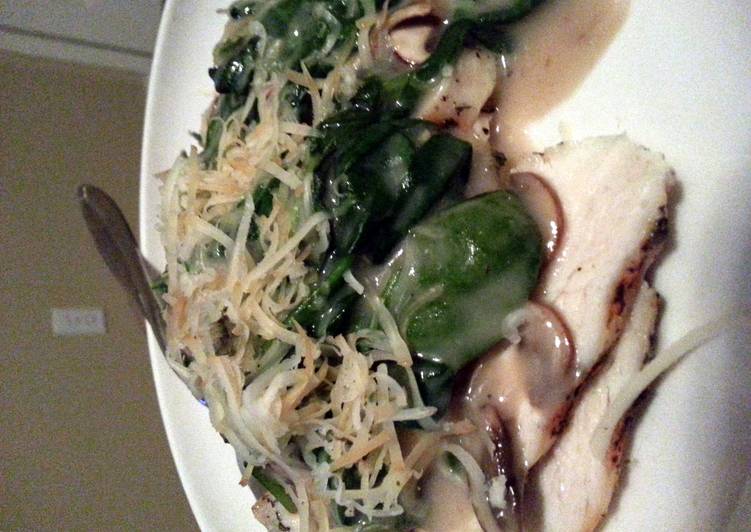 Creamy mushroom and spinach over grilled chicken breast