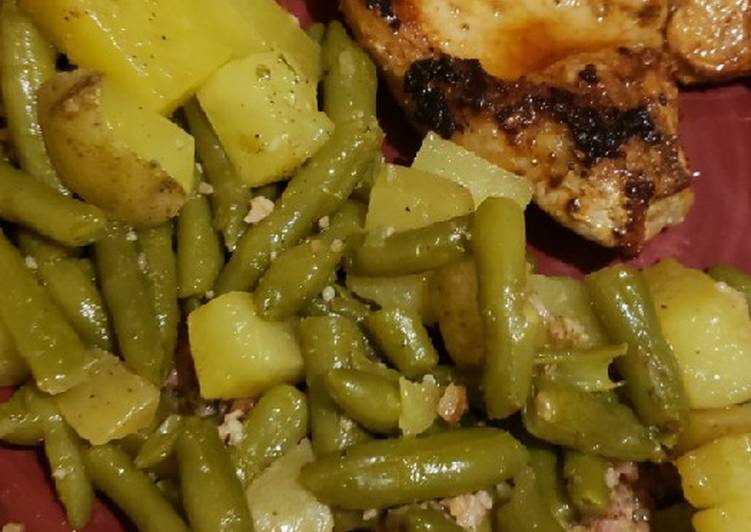 1 pan potatoes and greenbeans with pan fried bone-in pork chops