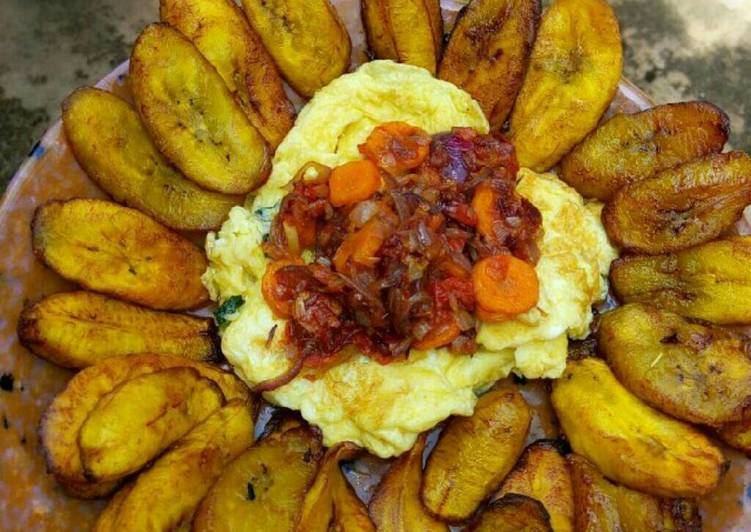 Fried plantain,scrambled eggs and carrot sauce