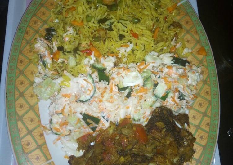 Fried rice, salad and grilled croaker fisg