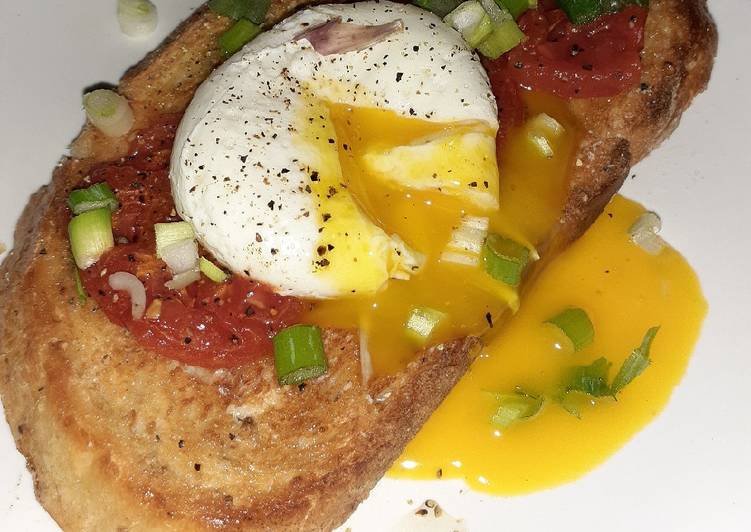 Tomato and poached egg garlic toast