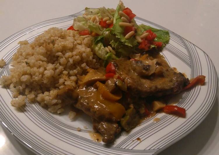 Beef picatta with brown rice and quinoa and a side salad