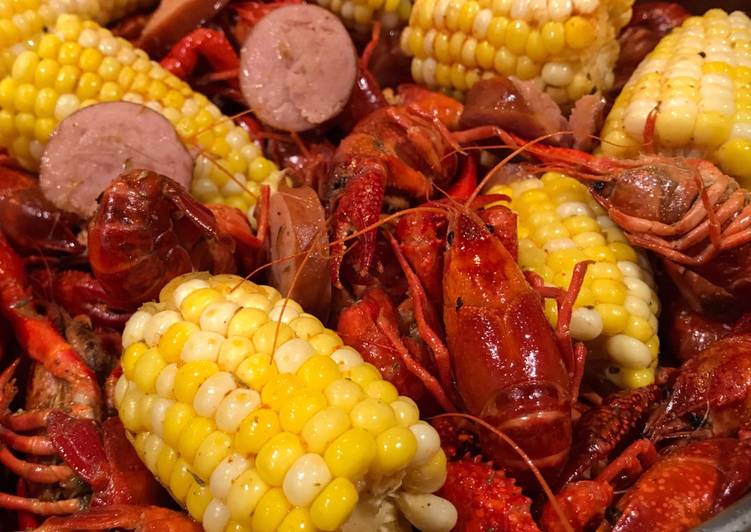 Cajun Inspired Spicy Buttered Crawfish Boil with Sausage and Corn