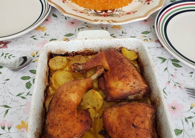 Red rice with chicken legs and potatoes