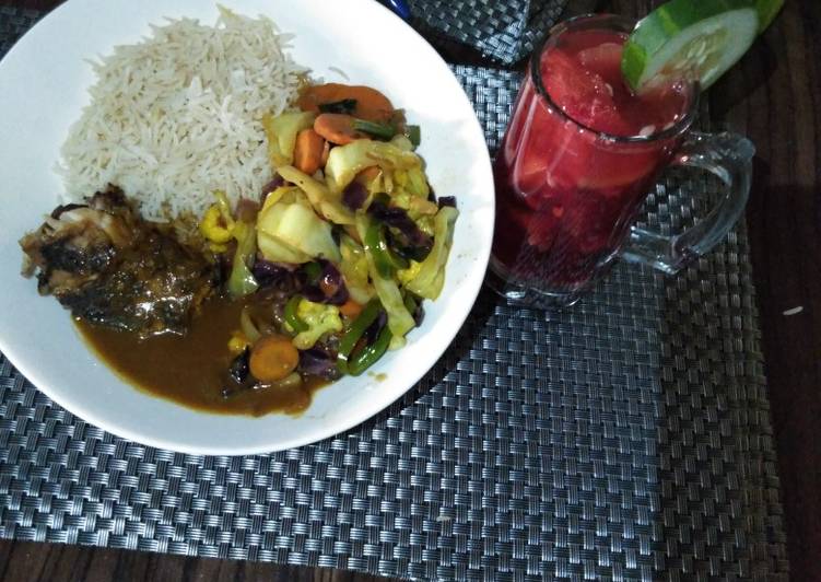 Grilled Crocker fish in Brown sauce wt Basmati Rice & Mixed Vegs